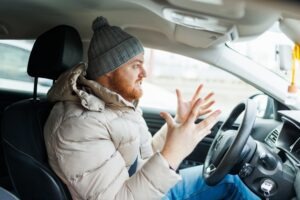 angry driver screaming at traffic