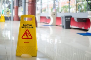 wet floor sign in an office lobby