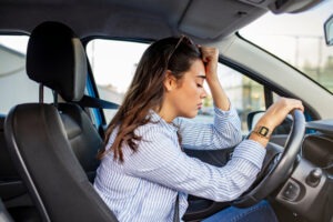 drunk woman at steering wheel